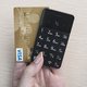 Illustration for article titled This Credit-Card-Size Cellphone Would Be the Ultimate Backup